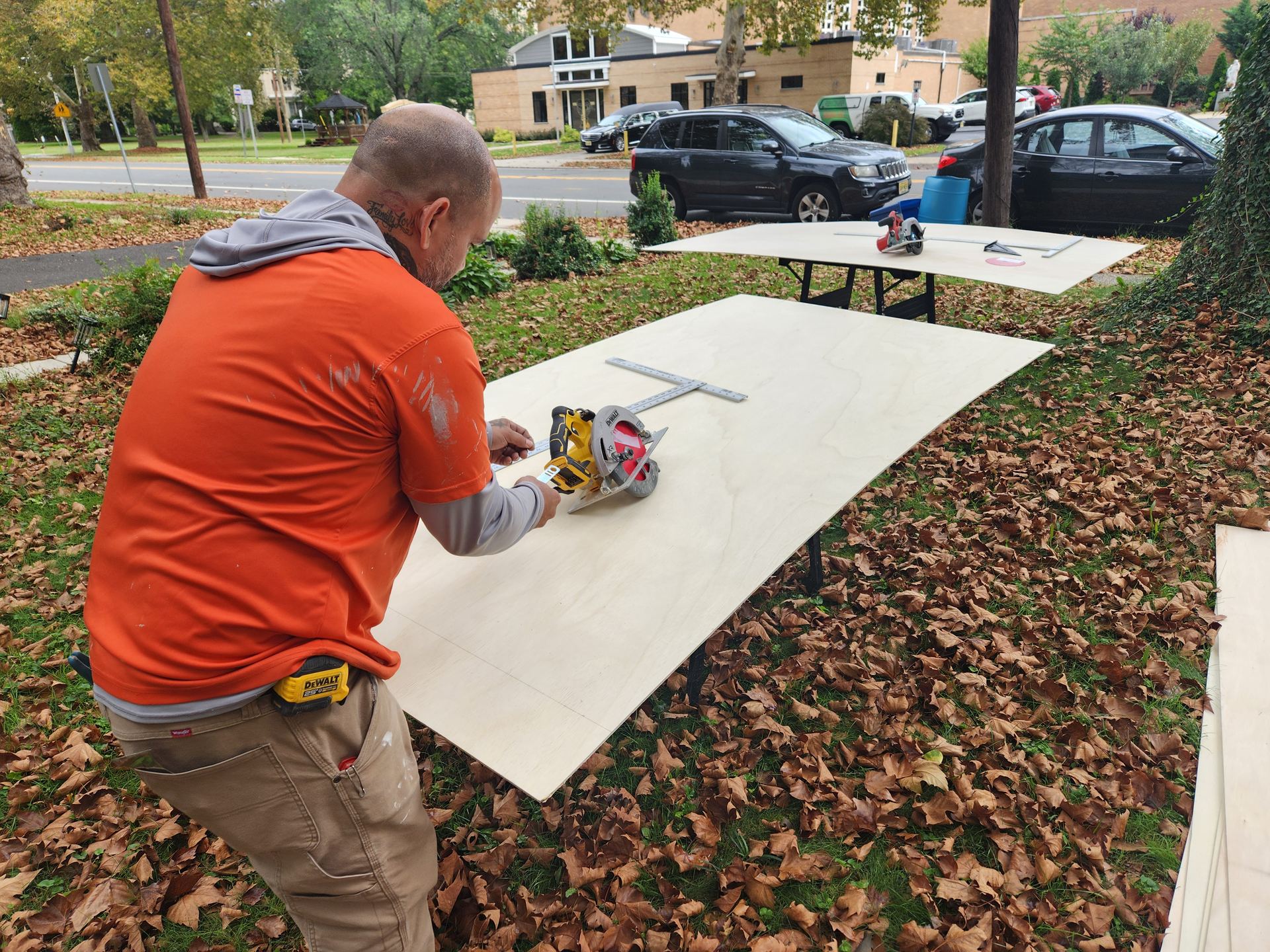 Side by Side crew member cutting panels on site during a South Jersey home project